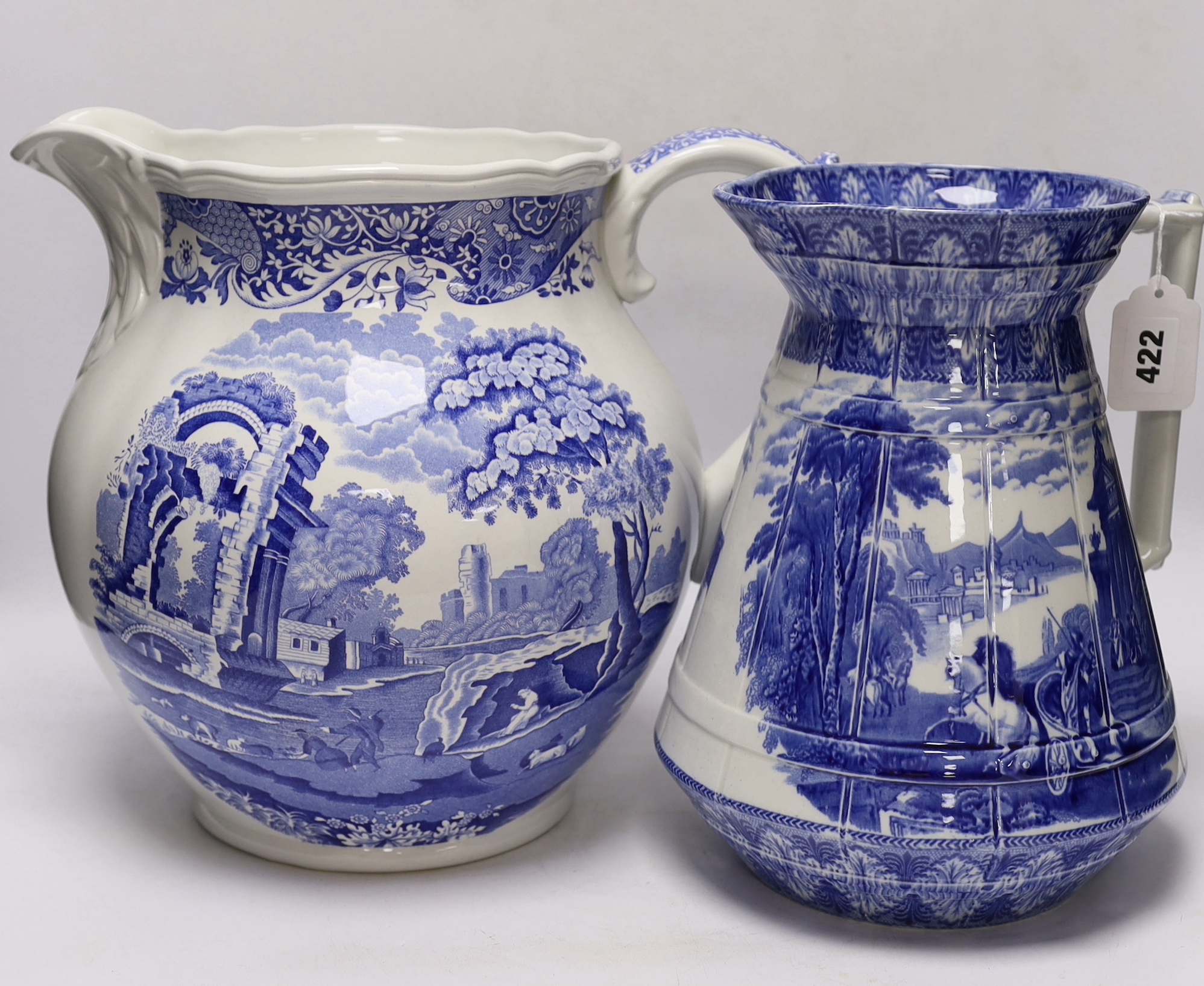 A quantity of blue and white plates, jugs, etc. including a large Spode Italian pattern jug, a George Jones Spanish costumes dish, a Cauldon ewer etc tallest 29cm (16)